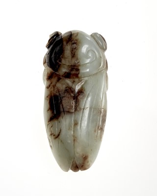 Lot 1 - A Chinese Black and White Jade Cicada