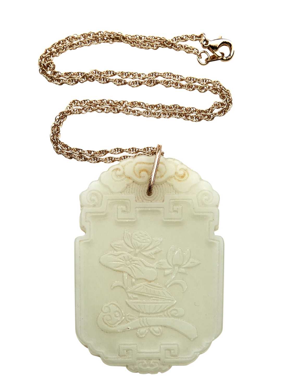 Lot 33 - A Chinese White Jade Pendant