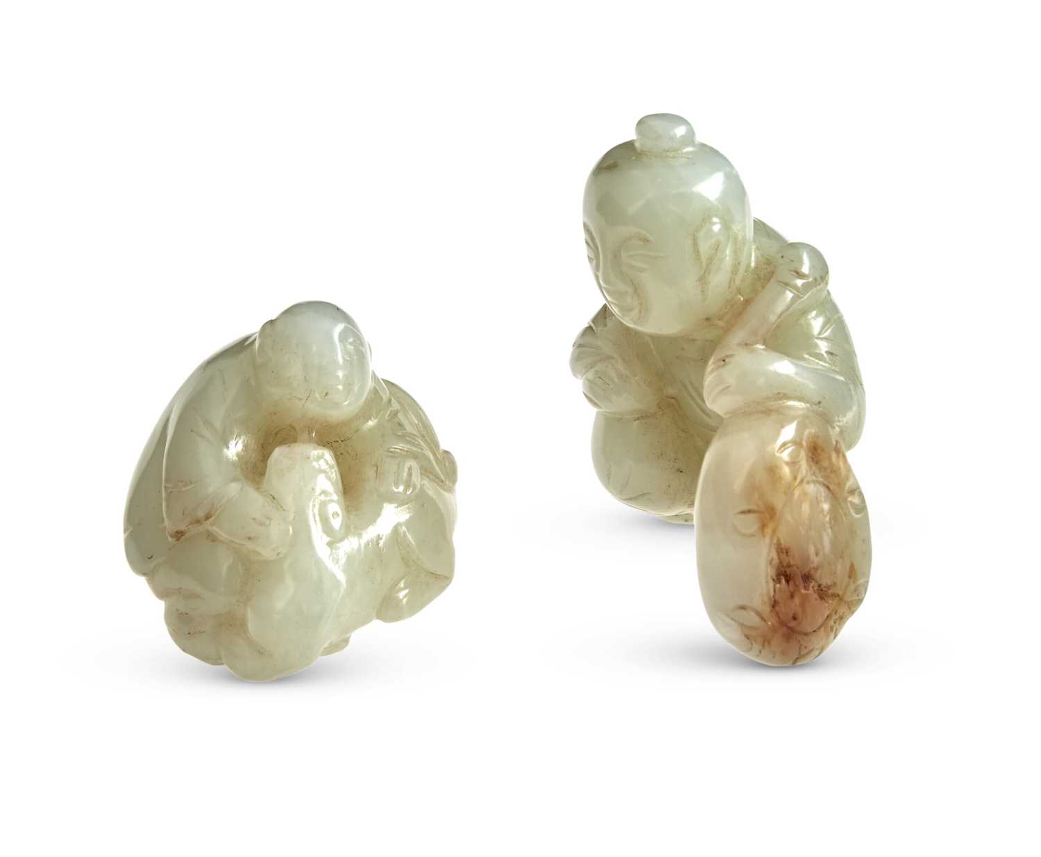 Lot 37 - Two Chinese Celadon Jade Figural Carvings