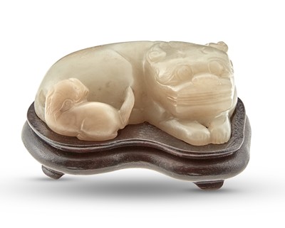 Lot 440 - A Chinese Carved Jade Lion