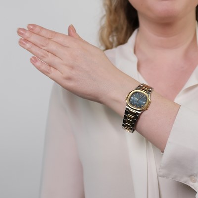Lot 81 - Patek Philippe Stainless Steel and Gold 'Nautilus' Wristwatch, Ref. 3900