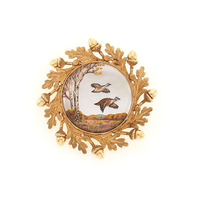 Lot 1183 - Gold and Carved Rock Crystal Reverse Intaglio Brooch