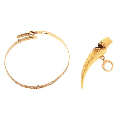 Lot 1225 - Antique Gold Bangle and T.B. Starr Whistle Charm