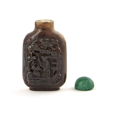 Lot 17 - A Chinese Carved Smoky Quartz Snuff Bottle