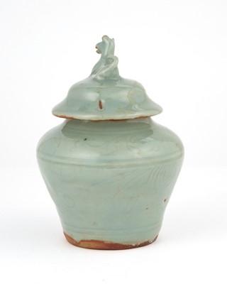 Lot 323 - A Chinese Celadon Glazed Jar and Cover