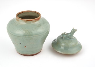 Lot 323 - A Chinese Celadon Glazed Jar and Cover