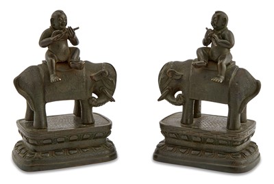 Lot 516 - A Pair of Chinese Bronze Models of Boys on Elephants