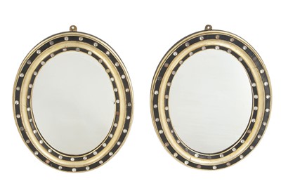 Lot 113 - Pair of Irish Victorian 'Jewel'-Mounted Part-Silvered and -Ebonized Oval Mirrors