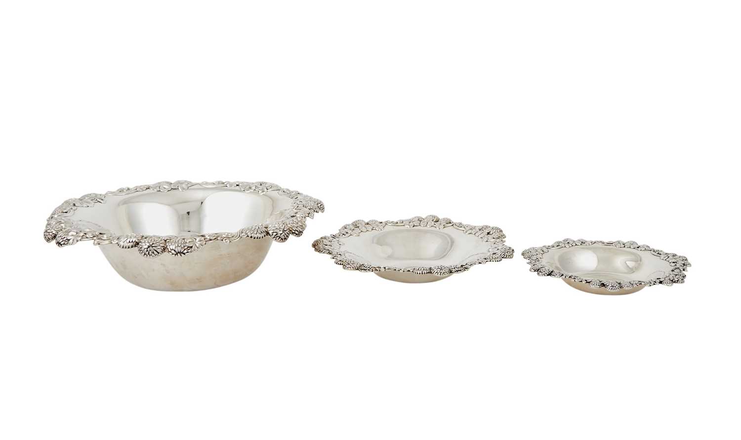 Lot 168 - Graduated Set of Three Tiffany & Co. Sterling Silver "Clover" Pattern Bowls