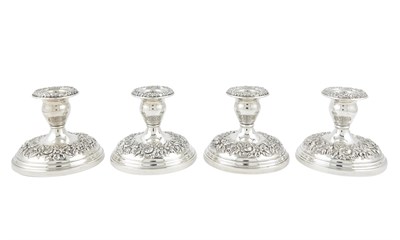 Lot 1142 - Set of Four S. Kirk & Son Sterling Silver Low Candlesticks
