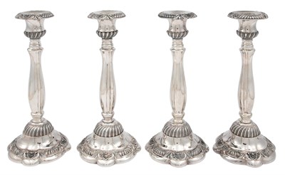 Lot 1144 - Set of Four Neiman Marcus Silver-Plated Candlesticks