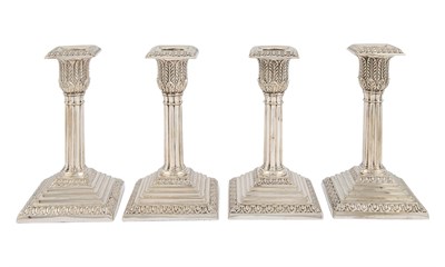 Lot 1113 - Set of Four Silver-Plated Column Form Candlesticks