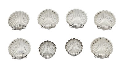 Lot 662 - Two Sets of English Sterling Silver and Silver-Plated Shell-Form Salts