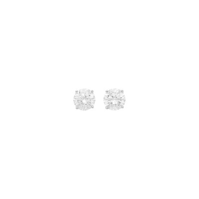 Lot 79 - Pair of White Gold, Diamond and Laser-Drilled Diamond Stud Earrings