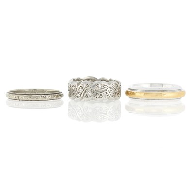 Lot 1122 - Two-Color Gold Band Ring, Platinum and Diamond Band Ring and White Gold Band Ring
