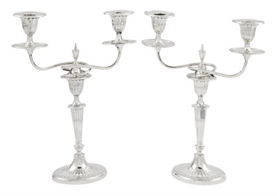 Lot 1074 - Pair of English Adams Style Sterling Silver Two-Light Candelabra