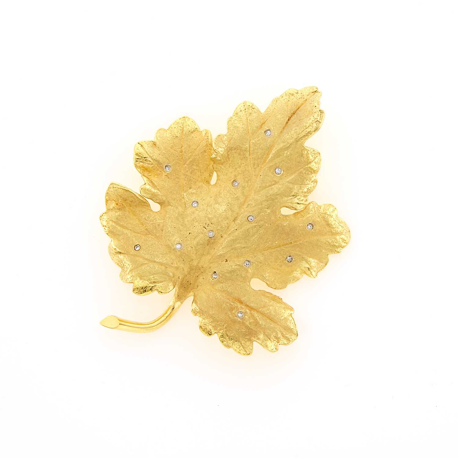 Lot 1044 - Gold and Diamond Leaf Brooch