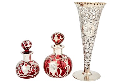 Lot 721 - Two Graduated American Silver Overlay Cranberry Glass Scent Flasks and a Silver Overlay Clear Glass Vase