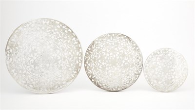Lot 685 - Graduated Set of Three American Sterling Silver and Glass Trivets