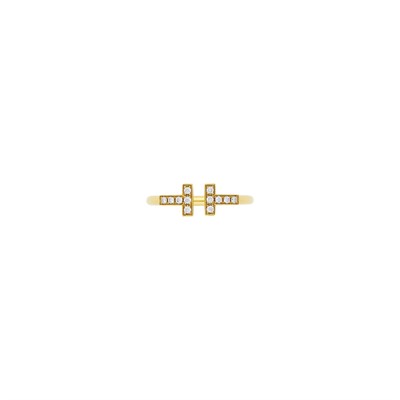Lot 1045 - Tiffany & Co. Gold and Diamond 'T Wire' Ring