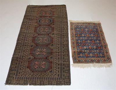 Lot 403 - Two Assorted Rugs A Salor Bokhara rug together...