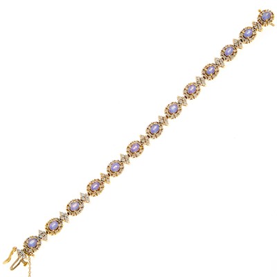 Lot 2165 - Two-Color Gold, Tanzanite and Diamond Bracelet