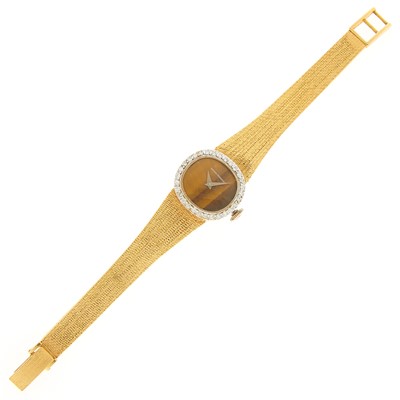 Lot 2049 - Girard Perregaux Two-Color Gold, Diamond and Tiger's Eye Wristwatch