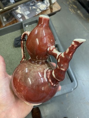 Lot 80 - A Chinese Peachbloom Glazed Porcelain Double Gourd Ewer