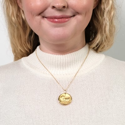 Lot 85 - Georges L'Enfant for Van Cleef & Arpels Gold Taurus Zodiac Pendant with Chain Necklace, France