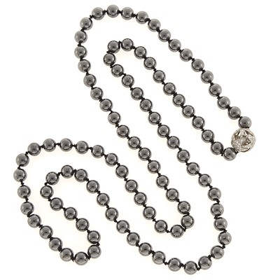 Lot 2062 - Long Hematite Bead Necklace with Platinum and Diamond Star Ball Clasp