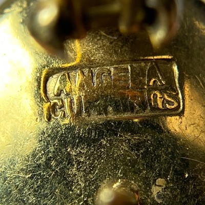 Lot 1142 - Angela Cummings Pair of Gold, Mother-of-Pearl and Hematite Earrings