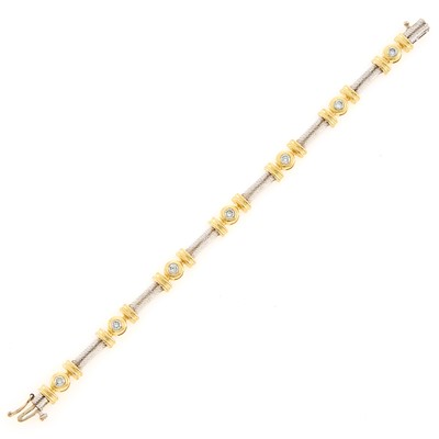 Lot 1071 - Two-Color Gold and Diamond Bracelet