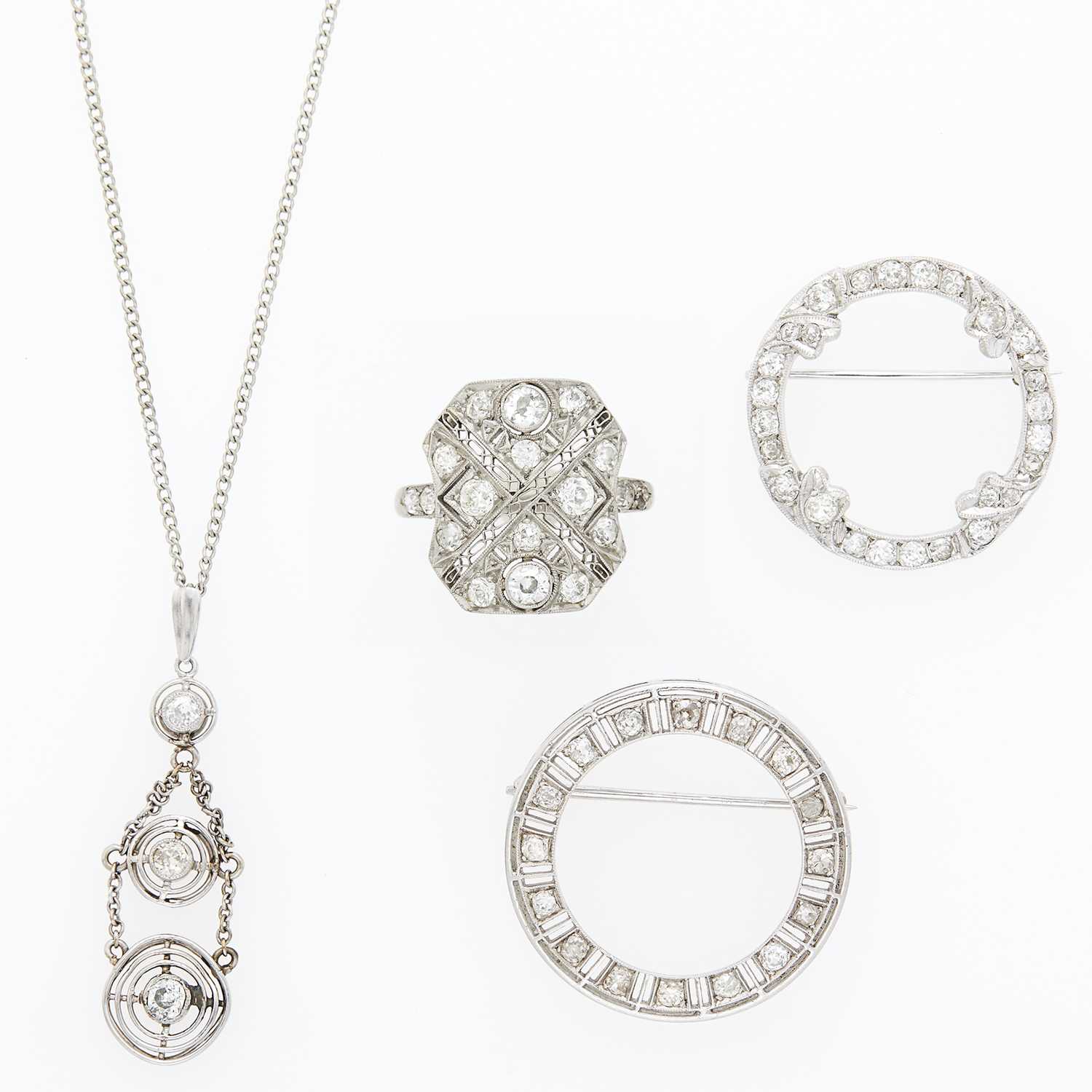 Lot 1089 - Two Platinum, White Gold and Diamond Circle Pins, Pendant-Necklace and Ring