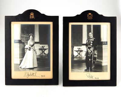 Lot 128 - A pair of royal photographs, signed by Queen Elizabeth and Prince Philip
