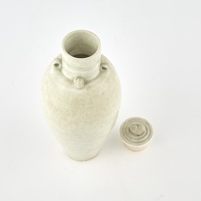 Lot 318 - A Chinese White Glazed Stoneware Vase and Cover