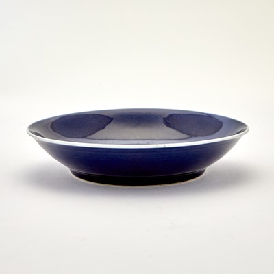Lot 153 - A Chinese Blue-Glazed Anhua-Decorated ‘Dragon’ Dish