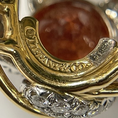 Lot 27 - Tiffany & Co., Schlumberger Gold, Platinum, Spessartite Garnet and Diamond 'Four Leaves' Ring