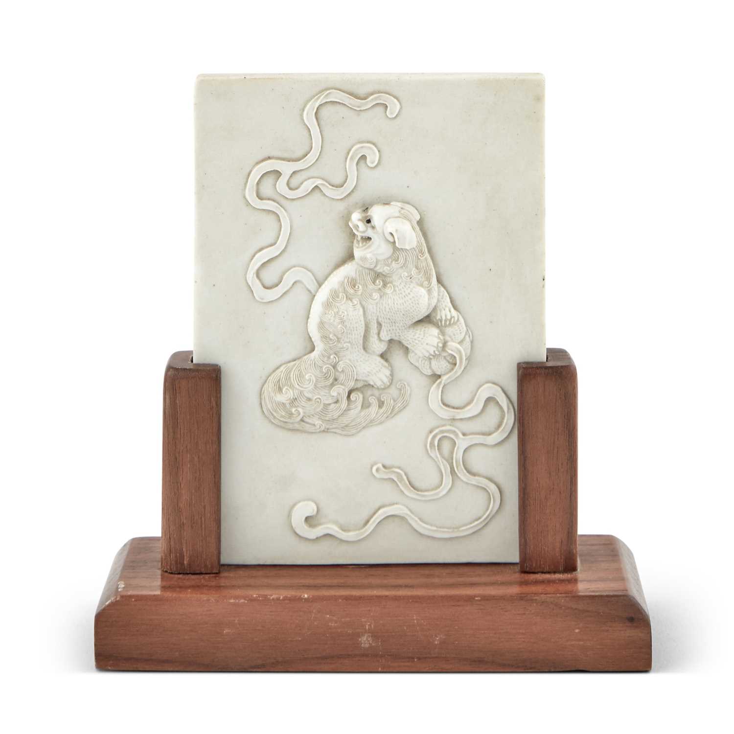 Lot 224 - A Chinese Molded Biscuit Porcelain Plaque