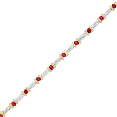Lot 1075 - Two-Color Gold, Ruby and Diamond Bracelet