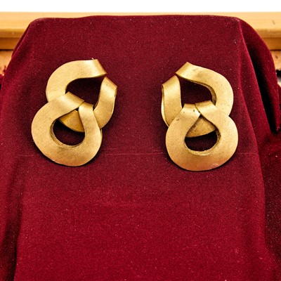 Lot 5021 - Pair of gilt-metal earclips worn by Jacqueline Kennedy