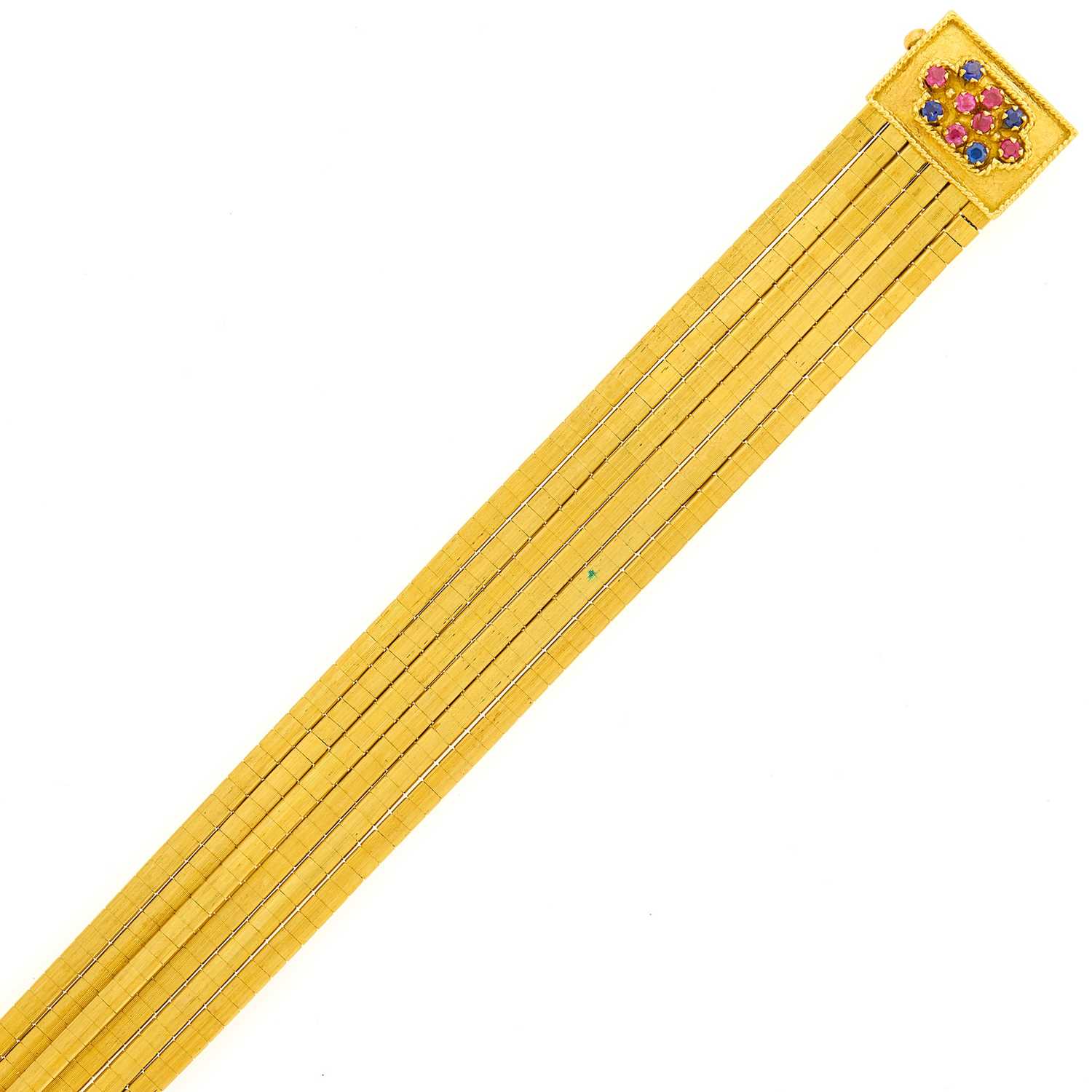 Lot 1113 - Six Strand Gold and Gem-Set Bracelet