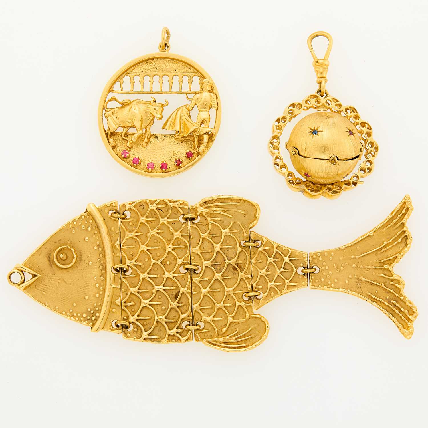 Lot 1173 - Three Gold Charms