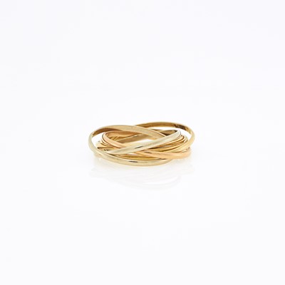 Lot 1045 - Cartier Tricolor Gold 'Trinity' Rolling Band Ring, France