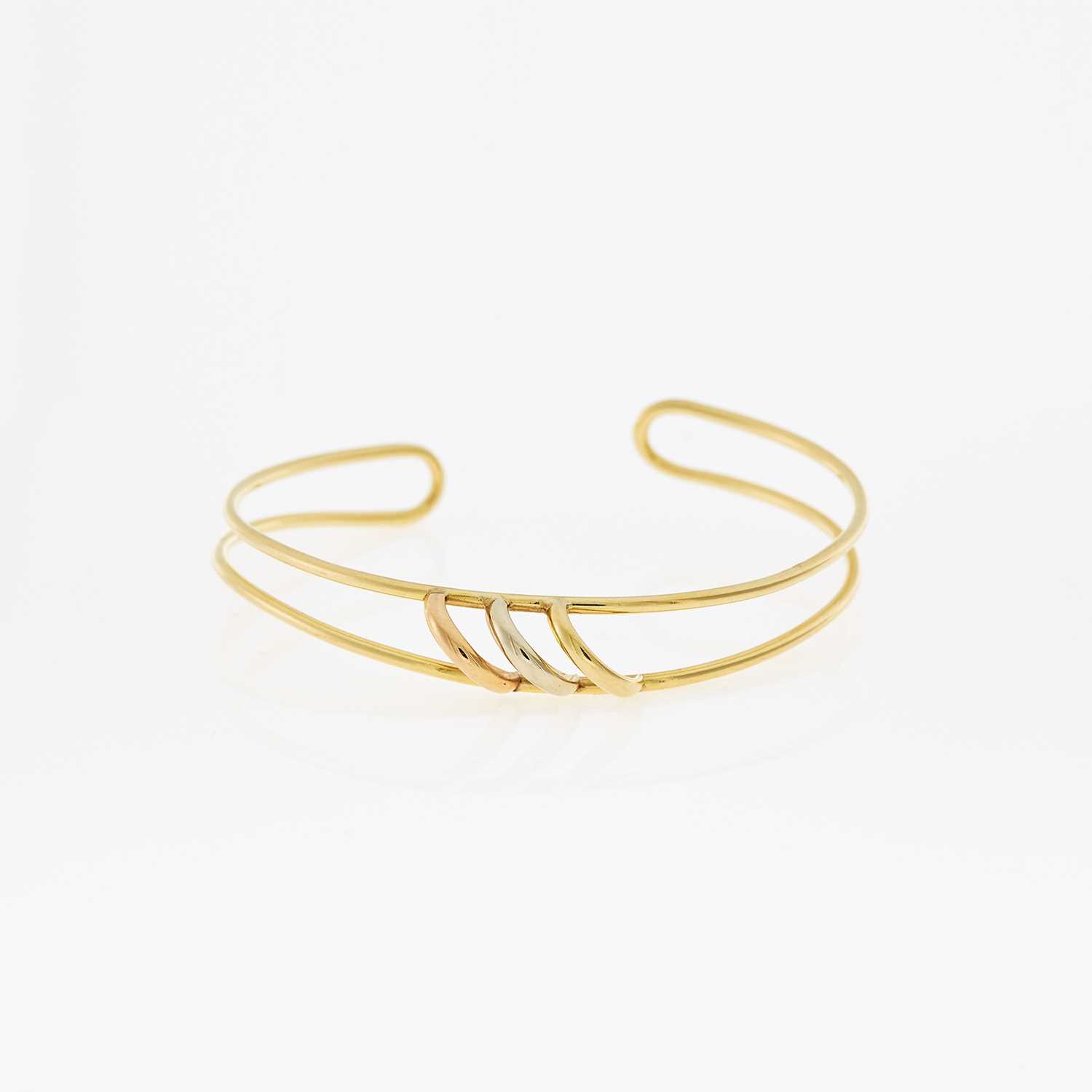 Lot 1110 - Cartier Tricolor Gold 'Trinity' Bangle Bracelet