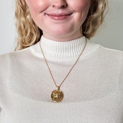 Lot 3 - Cartier Paris Gold 'Taurus' Pendant with Gold Chain Necklace