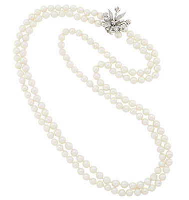 Lot 1083 - Long Double Strand Cultured Pearl Necklace with White Gold and Diamond Clasp