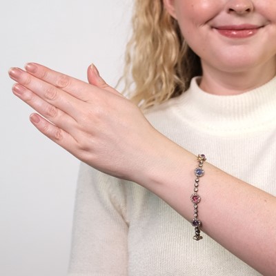 Lot 94 - Antique Silver, Gold, Pink and Purple Cabochon Sapphire and Diamond Bracelet