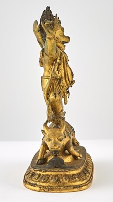 Lot 553 - A Tibetan Gilt Bronze Figure of Yama
