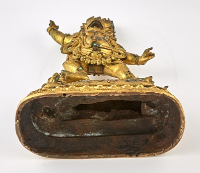 Lot 553 - A Tibetan Gilt Bronze Figure of Yama