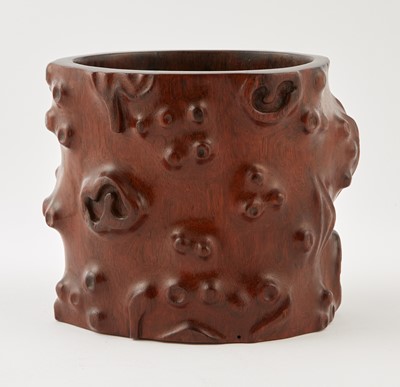 Lot 500 - A Chinese Huanghuali Naturalistic Carved Brush Pot
